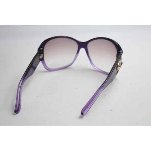 2383 - A pair of Gucci purple framed sunglasses with original case