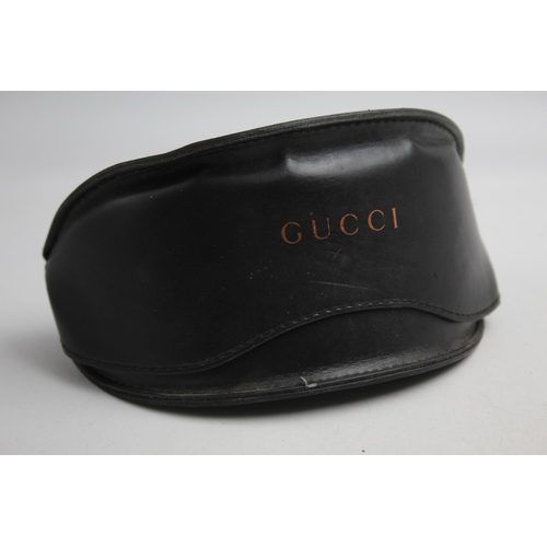 2383 - A pair of Gucci purple framed sunglasses with original case