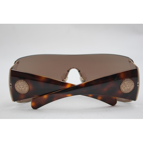 2384 - A pair of Versace brown tinted oversized frameless sunglasses