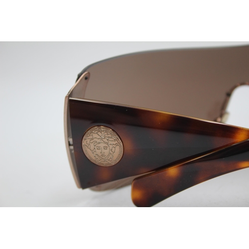 2384 - A pair of Versace brown tinted oversized frameless sunglasses