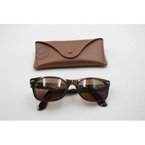 2390 - A pair of Ray-Ban Wayfarer brown tortoishell sunglasses with original case