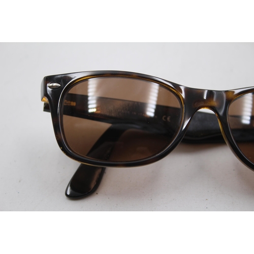 2390 - A pair of Ray-Ban Wayfarer brown tortoishell sunglasses with original case