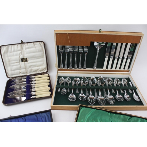 328 - Four vintage boxed cutlery sets to include fish cutlery etc.