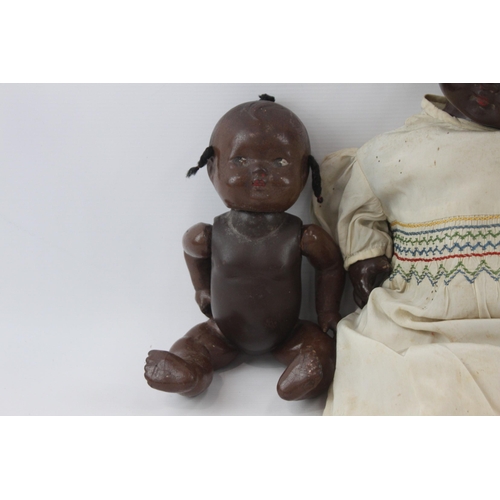 373 - Two vintage baby dolls