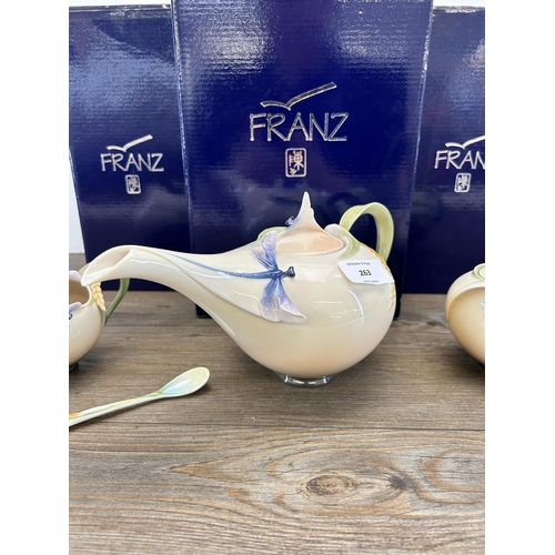 263 - Three pieces of boxed Franz Dragonfly porcelain designed by Jen Woo, teapot, sugar jar and cream jug