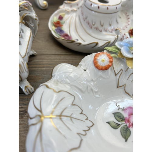 268 - A collection of mid/late 20th century Plau Schierholz (PMP) hand painted porcelain to include candle... 