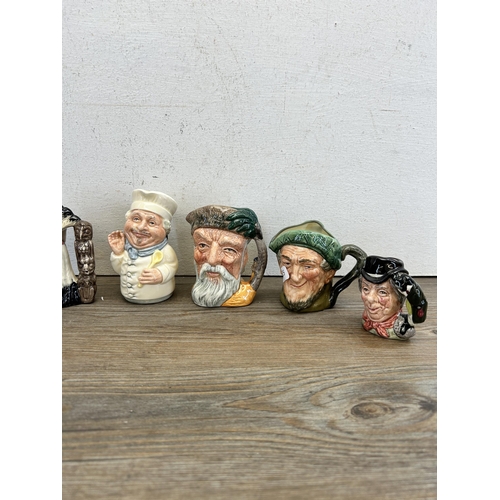 286 - Six Royal Doulton miniature character jugs to include North American Indian - D6614, Robinson Crusoe... 