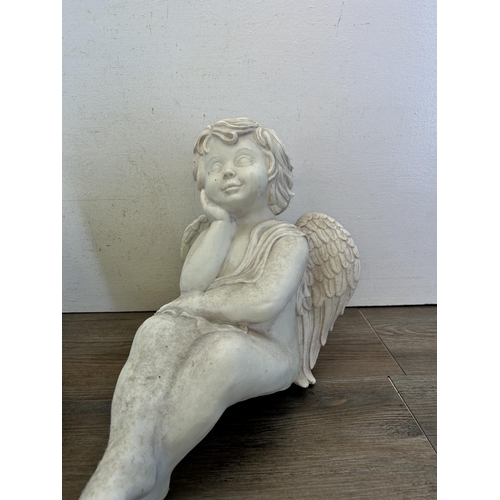 296 - Two ArtLine resin cherub figurines - approx. 30cm high