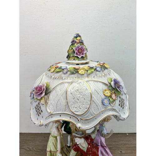 305 - A mid 20th century Plaue Schierholz (PMP) hand painted porcelain figural table lamp - approx. 57cm h... 