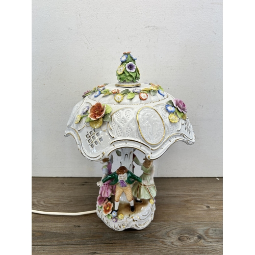 306 - A mid 20th century Plaue Schierholz (PMP) hand painted porcelain figural table lamp - approx. 29cm h... 