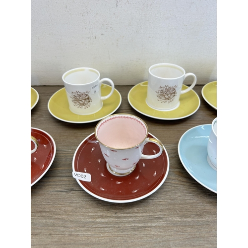 310 - Seven Susie Cooper coffee cups and saucers