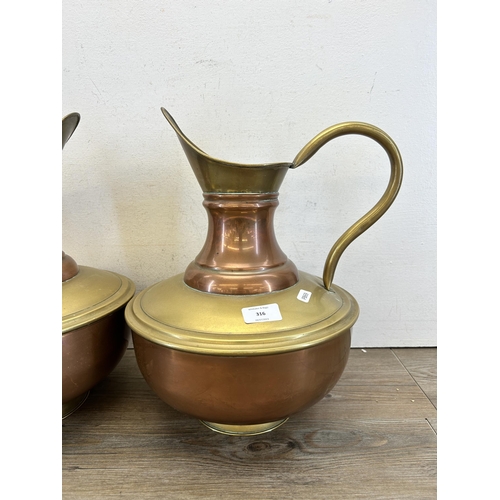 316 - A pair of early 20th century copper and brass pitchers