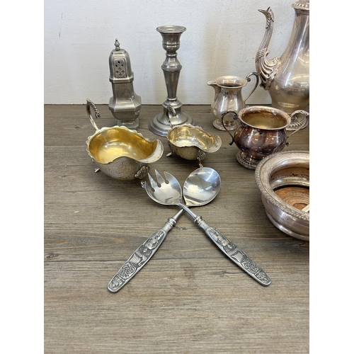 323 - A collection of brass and silver plated ware to include Barker Ellis four piece coffee and tea set c... 