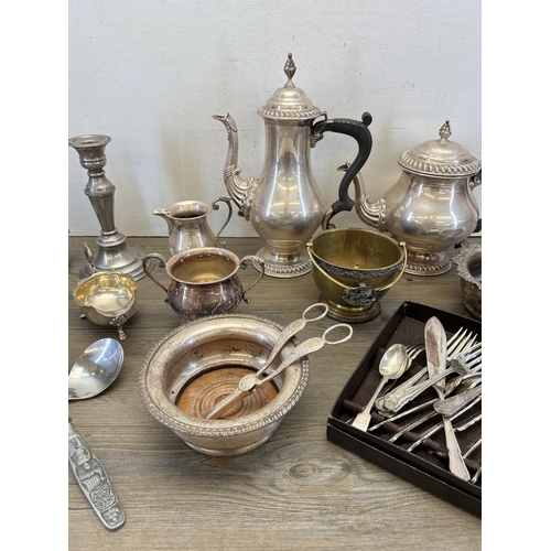 323 - A collection of brass and silver plated ware to include Barker Ellis four piece coffee and tea set c... 