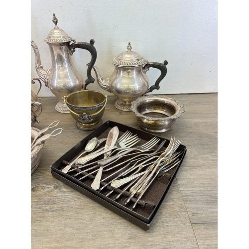 323 - A collection of brass and silver plated ware to include Barker Ellis four piece coffee and tea set c... 