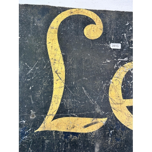 332 - An early/mid 20th century metal 'Leek' sign - approx. 62cm high x 90cm wide