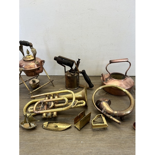 337 - A collection of antique and later metalware to include N.E.C 843 brass trumpet, copper and brass spi... 