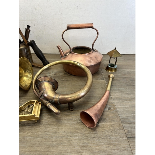 337 - A collection of antique and later metalware to include N.E.C 843 brass trumpet, copper and brass spi... 