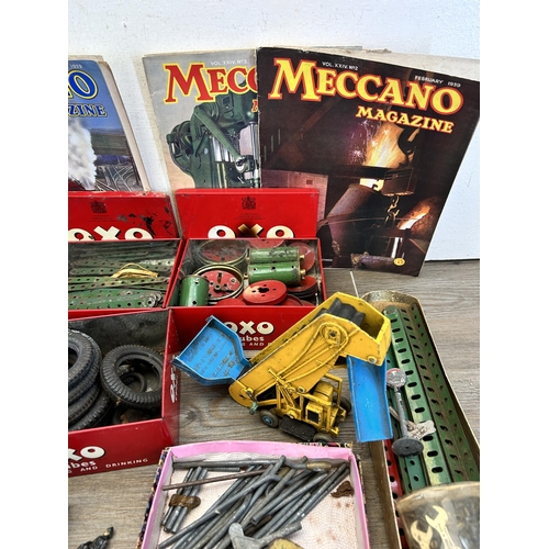 343 - A large collection of vintage Meccano accessories to include 1939 magazines, fixings, fittings etc.