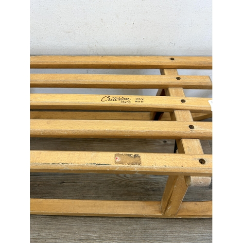 344 - A vintage Criterion Davos Stock No. 05-35 beech snow sledge with metal runners - approx 25cm high x ... 