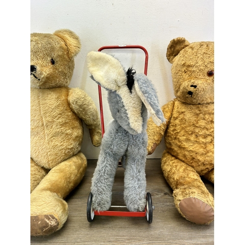 358 - Three vintage soft toys, one Pedigree push along horse and two articulated teddy bears