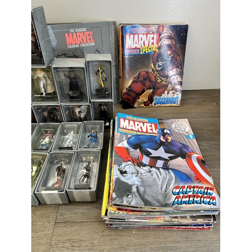 359 - A large collection of Marvel accessories to include approx. 49 boxed The Classic Marvel figurines wi... 