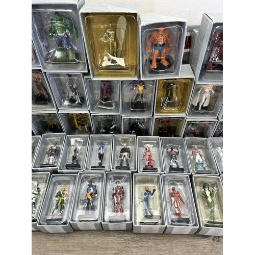 359 - A large collection of Marvel accessories to include approx. 49 boxed The Classic Marvel figurines wi... 