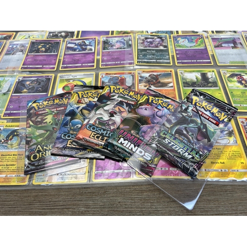 363 - A collection of Pokémon trading cards to include Sun & Moon Comic Eclipse, Sun & Moon Celestial Stor... 