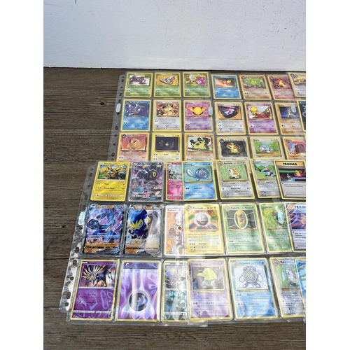 364 - A collection of Pokémon trading cards to include vintage 1999 Team Rocket etc.