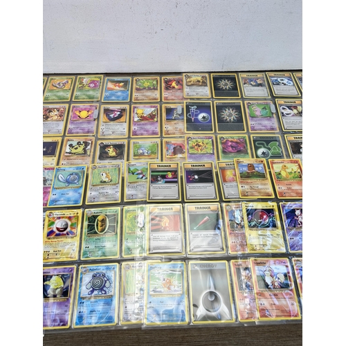 364 - A collection of Pokémon trading cards to include vintage 1999 Team Rocket etc.