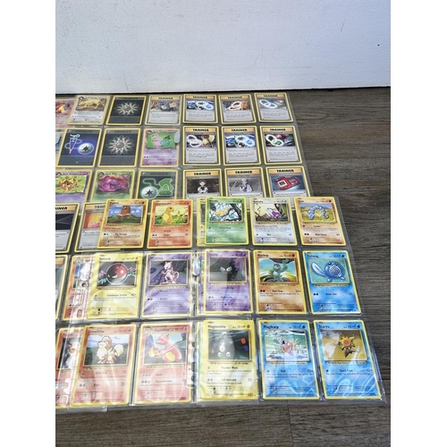 364 - A collection of Pokémon trading cards to include vintage 1999 Team Rocket etc.