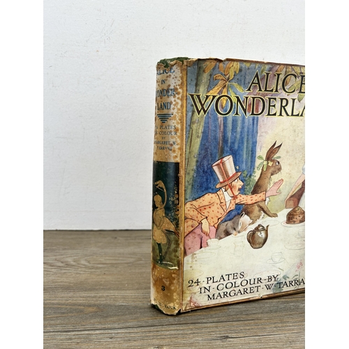 392 - A vintage hardback edition of Alice's Adventures in Wonderland by Lewis Carroll with 24 colour plate... 