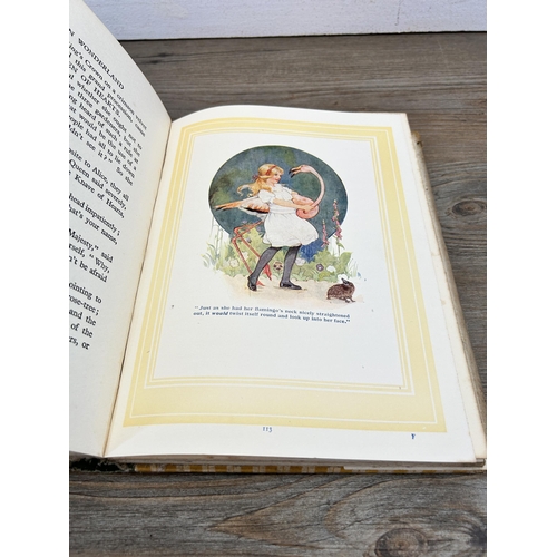 392 - A vintage hardback edition of Alice's Adventures in Wonderland by Lewis Carroll with 24 colour plate... 