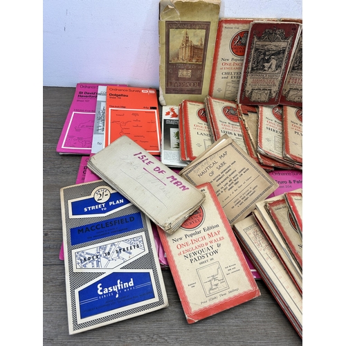 393 - A large collection of antique and later Ordnance Survey Maps to include Barmouth and District, Derby... 