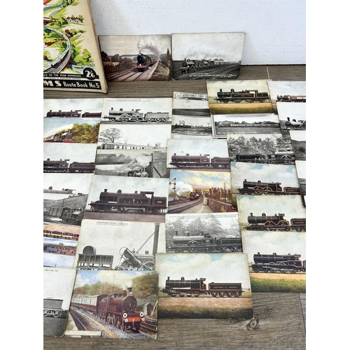 399 - A collection of early 20th century and later postcards and books to include All About our British Ra... 