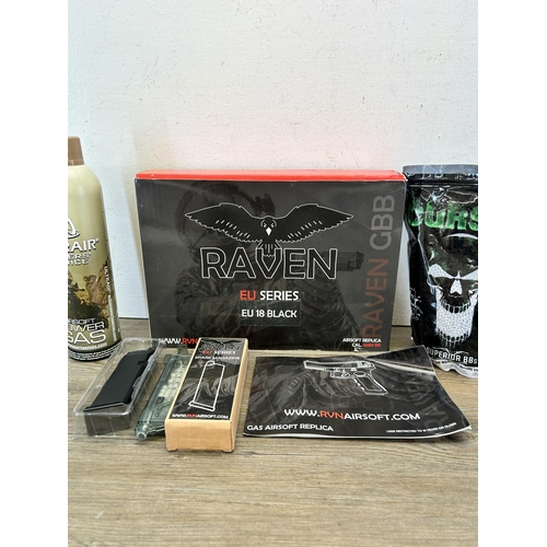 413 - A collection of airsoft equipment to include Raven EU Series spare magazine, ASG Cursed Series super... 