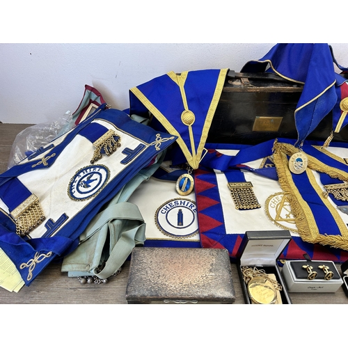 422 - A collection of Masonic regalia to include tankard, sash, Cheshire medallion etc.