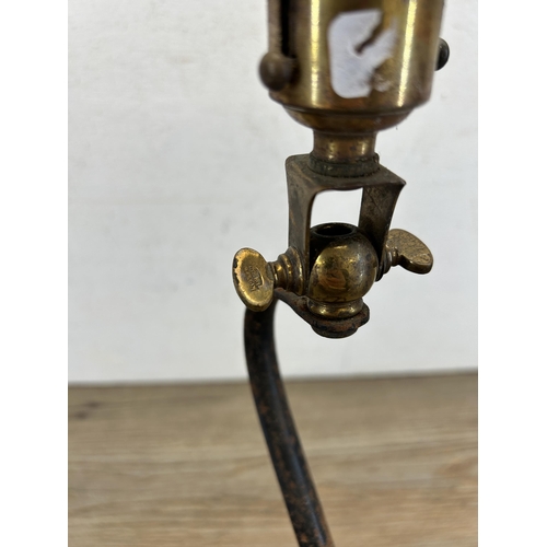 425 - A late 19th/early 20th century W. A. S. Benson wrought iron and brass desk lamp - approx. 34cm high