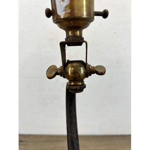 425 - A late 19th/early 20th century W. A. S. Benson wrought iron and brass desk lamp - approx. 34cm high