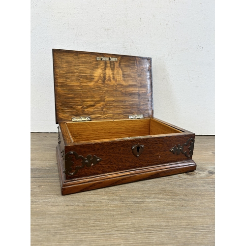 433 - An early 20th century oak and copper cigar box - approx. 9cm high x 24cm wide x 16cm deep