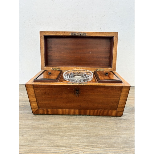 434 - A Georgian walnut sarcophagus shaped two division tea caddy with later added glass bowl - approx. 18... 