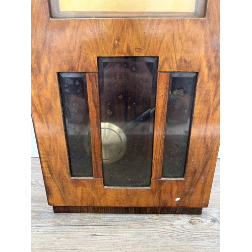 439 - A mid 20th century walnut cased chiming wall clock with pendulum and key - approx. 65cm high x 32cm ... 