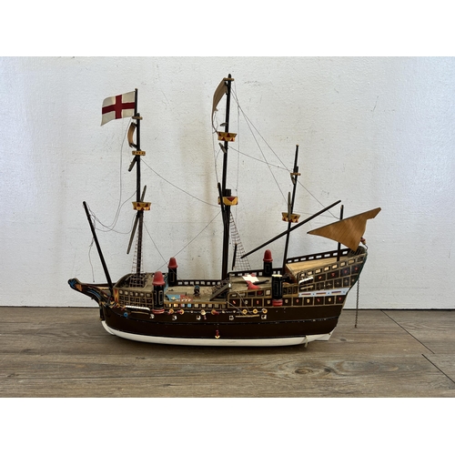 447 - Six items to include late 19th/early 20th century toleware tray, model sailing ship, pine work box, ... 