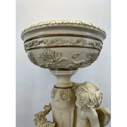 455 - A Neoclassical style resin figural bird feeder - approx. 57cm high