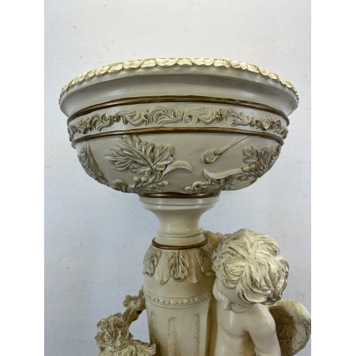 455 - A Neoclassical style resin figural bird feeder - approx. 57cm high