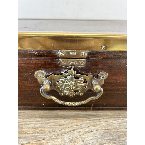 456 - An early/mid 20th century stained hardwood and brass banded box - approx. 11cm high x 46cm wide x 36... 