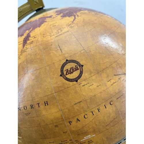 469 - A Zoffoli reproduction terrestrial globe on stand - approx. 43cm high