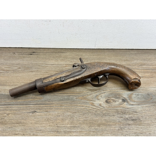 476 - A mid 19th century percussion pistol - approx. 34cm long