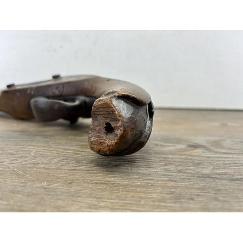 476 - A mid 19th century percussion pistol - approx. 34cm long