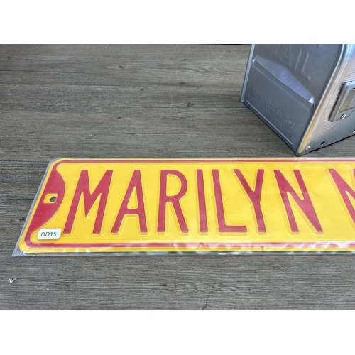 480 - Two items, one The Three Daughters Ltd Marilyn Monroe Ave sign - approx. 15cm high x 91cm wide and o... 